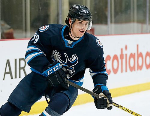 JOHN WOODS / WINNIPEG FREE PRESS
Manitoba Moose Jeff Malott (39) plays against Stockton Heat during first period AHL action in Winnipeg on Thursday, March 11, 2021.

Reporter: Allen