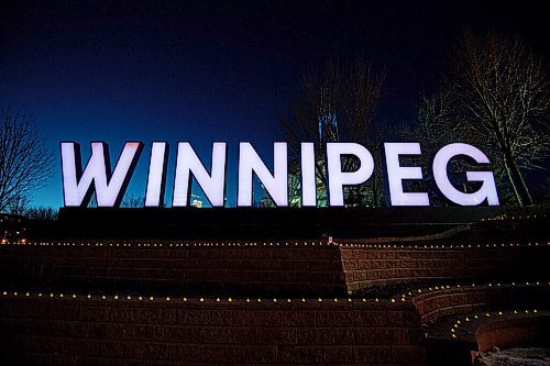 MIKE SUDOMA / WINNIPEG FREE PRESS
Hundreds of tea lights line the ledges in front of the Winnipeg sign at Scotia Bank Stage to commemorate the lives lost during the first year of the Covid 19 pandemic. The top of the Canada Museum for Human Rights tower will be lit up blue in tribute to the health care workers who have been on the frontlines of the pandemic. The memorial will be on display form March 11-14.
March 10, 2021