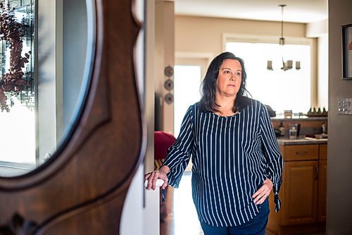 MIKAELA MACKENZIE / WINNIPEG FREE PRESS

Michelle Bailey, who is 51 and getting a covid vaccine next week as she is eligible due to underlying conditions, poses for a portrait in her home in Winnipeg on Friday, March 12, 2021. For Kevin Rollason story.

Winnipeg Free Press 2021