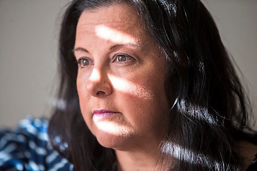 MIKAELA MACKENZIE / WINNIPEG FREE PRESS

Michelle Bailey, who is 51 and getting a covid vaccine next week as she is eligible due to underlying conditions, poses for a portrait in her home in Winnipeg on Friday, March 12, 2021. For Kevin Rollason story.

Winnipeg Free Press 2021