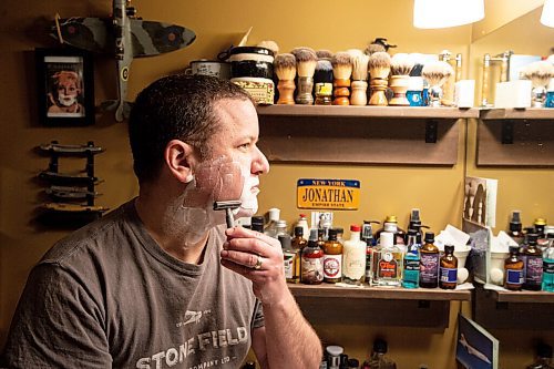 MIKE SUDOMA / WINNIPEG FREE PRESS
Stone Field Shaving Co owner, Jonathan Steinfeld, uses one of the razors he sells inside his self proclaimed man cave of shaving Friday morning
March 12, 2021