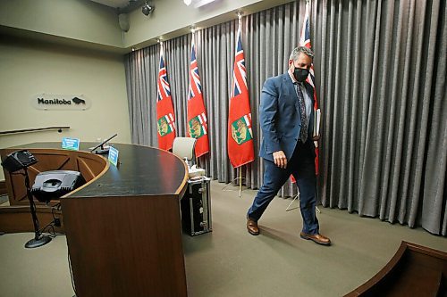 JOHN WOODS / WINNIPEG FREE PRESS
Cliff Cullen, Manitoba Minister of Education, leaves at the end of a press conference about Bill 64, a bill to overhaul the Manitoba K-12 education system, at the Manitoba Legislature in Winnipeg Monday, March 15, 2021.

Reporter: ?