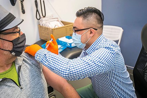 MIKAELA MACKENZIE / WINNIPEG FREE PRESS

Pharmacist Ryan Chan gives John Giavedoni an Oxford-AstraZeneca vaccine at the Exchange District Pharmacy in Winnipeg on Tuesday, March 16, 2021. For --- story.

Winnipeg Free Press 2021