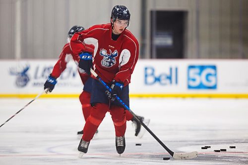 MIKE DEAL / WINNIPEG FREE PRESS
Manitoba Moose Ville Heinola (34) during practice at MTS IcePlex Tuesday afternoon.
210316 - Tuesday, March 16, 2021.