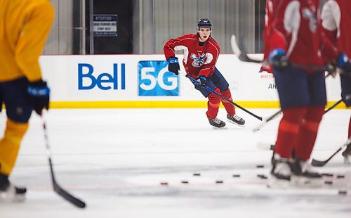 MIKE DEAL / WINNIPEG FREE PRESS
Manitoba Moose Ville Heinola (34) during practice at MTS IcePlex Tuesday afternoon.
210316 - Tuesday, March 16, 2021.