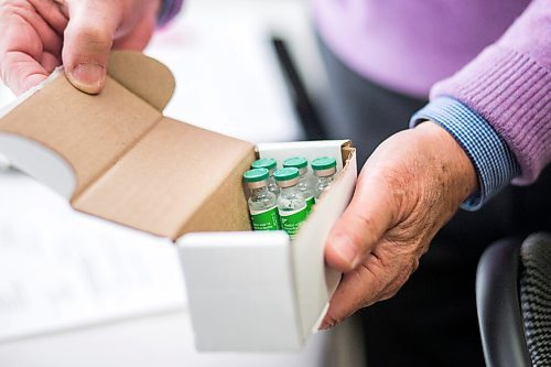 MIKAELA MACKENZIE / WINNIPEG FREE PRESS

Dr. Gerry Clayden poses for a portrait with vials of the vaccine at Carman Medical Group in Carman on Wednesday, March 17, 2021. Dr. Clayden says that the eligibility criteria is too narrow. For Carol Sanders story.

Winnipeg Free Press 2021