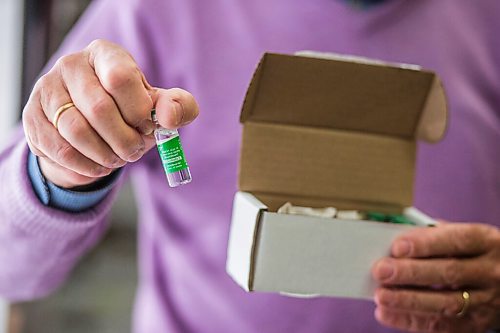 MIKAELA MACKENZIE / WINNIPEG FREE PRESS

Dr. Gerry Clayden poses for a portrait with vials of the vaccine at Carman Medical Group in Carman on Wednesday, March 17, 2021. Dr. Clayden says that the eligibility criteria is too narrow. For Carol Sanders story.

Winnipeg Free Press 2021