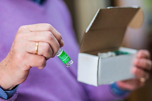 MIKAELA MACKENZIE / WINNIPEG FREE PRESS

Dr. Gerry Clayden poses for a portrait with vials of the vaccine at Carman Medical Group in Carman on Wednesday, March 17, 2021. Dr. Clayden says that the eligibility criteria is too narrow. For Carol Sanders story.

Winnipeg Free Press 2021