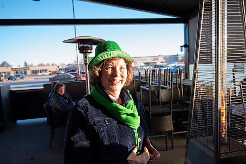 MIKE SUDOMA / WINNIPEG FREE PRESS 
Kerrine Wilson is happy to be able to spend some time with friends as they celebrate St Patricks Day together at Fionns Grant Park Wednesday evening
March 17, 2021