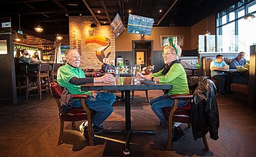 MIKE SUDOMA / WINNIPEG FREE PRESS 
Don and Ethel McCully enjoy some time away from home as they enjoy St Patricks Day together at Fionns Grant Park Wednesday evening
March 17, 2021