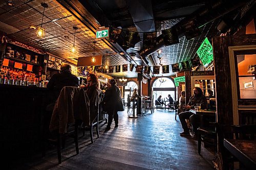 MIKE SUDOMA / WINNIPEG FREE PRESS 
Although the Kings Head Pub has seen busier St Patricks Days, the pub was quite bustling both inside and outside on the patio.
March 17, 2021