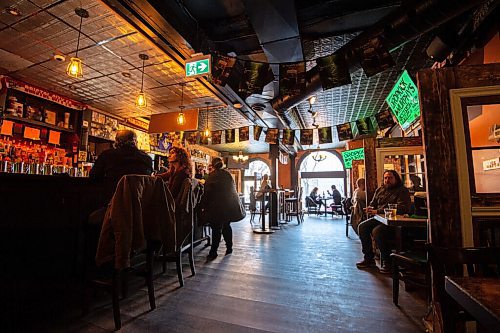 MIKE SUDOMA / WINNIPEG FREE PRESS 
Although the Kings Head Pub has seen busier St Patricks Days, the pub was quite bustling both inside and outside on the patio.
March 17, 2021