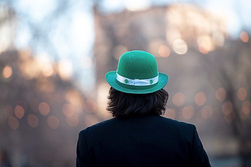 MIKE SUDOMA / WINNIPEG FREE PRESS 
A man (name with held) wearing a St Patricks day hat, complete with shamrocks hangs out at the cube Wednesday evening after celebrating St Patricks day with his father at the Kings Head Pub.
March 17, 2021