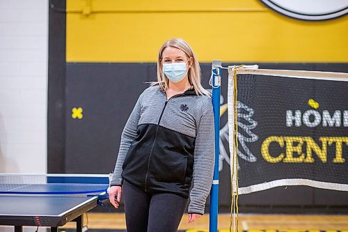 MIKAELA MACKENZIE / WINNIPEG FREE PRESS

P.E. teacher Deondra Twerdun-Peters poses for a portrait at the Fort Richmond Collegiate gym in Winnipeg on Thursday, March 18, 2021. For Maggie Macintosh story.

Winnipeg Free Press 2021