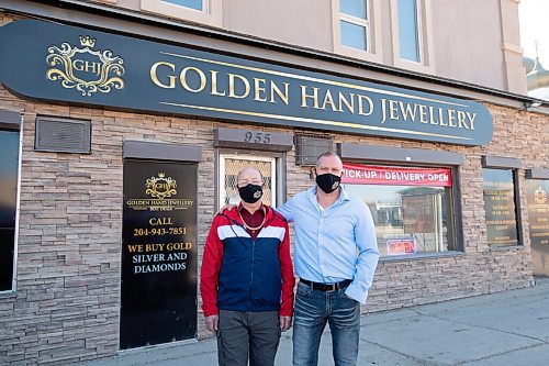 MIKE SUDOMA / WINNIPEG FREE PRESS 
Owner Paul Szurlej and his father, Chester Szurlej in front of their first Main St Golden Hand Jewellery location Friday morning
March 19, 2021