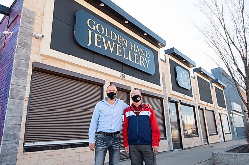 MIKE SUDOMA / WINNIPEG FREE PRESS 
Owner Paul Szurlej and his father, Chester Szurlej in front of their businesses new building, just a coupldof doors down from their original location on Main St.
The Golden Hand Jewellery
March 19, 2021