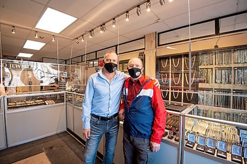 MIKE SUDOMA / WINNIPEG FREE PRESS 
Owner Paul Szurlej and his father, Chester Szurlej inside the doors of Golden Hand Jewellerys original Main St location Friday morning
March 19, 2021