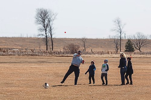 MIKE DEAL / WINNIPEG FREE PRESS
Scott Moore with wife Julia Allen and their children, Cole, 10, Davis, 8, and Luke, 6, with Rosie the dog at La Barriere park Friday afternoon.
210319 - Friday, March 19, 2021.