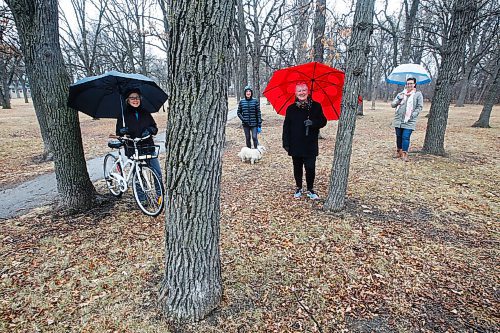JOHN WOODS / WINNIPEG FREE PRESS
Jean Altemeyer, from left, Roxana Mazur with Starr, Erna Buffie and Emma Durand-Wood from Trees Please Winnipeg are photographed in McKittrick Park on Rathgar Avenue in Winnipeg Sunday, March 21, 2021. The group is concerned that diseased trees are being cut down in the city, are not replaced, and the stumps remain for years.

Reporter: Lawrynuik