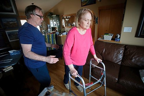 JOHN WOODS / WINNIPEG FREE PRESS
Ken Miller, 69, assists his wife, Cheryl, 65, who has MS and Diabetes, at their home in Oakbank Sunday, March 21, 2021. Miller, who is healthy and is Cheryls primary caregiver, says he can get vaccinated but his wife, who is immune compromised, can not get vaccinated.

Reporter: Lawrynuik