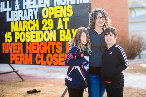 MIKAELA MACKENZIE / WINNIPEG FREE PRESS

Sara Robert and her kids, Elodie (nine) and Drew (seven), pose for a portrait at the closed River Heights Library in Winnipeg on Monday, March 22, 2021. For Jen Zoratti story.

Winnipeg Free Press 2021