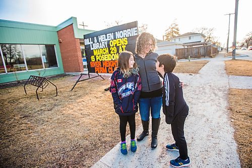 MIKAELA MACKENZIE / WINNIPEG FREE PRESS

Sara Robert and her kids, Elodie (nine) and Drew (seven), pose for a portrait at the closed River Heights Library in Winnipeg on Monday, March 22, 2021. For Jen Zoratti story.

Winnipeg Free Press 2021