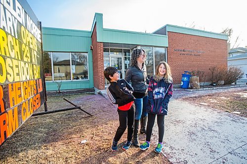 MIKAELA MACKENZIE / WINNIPEG FREE PRESS

Sara Robert and her kids, Elodie (nine) and Drew (seven), pose for a portrait at the closed River Heights Library in Winnipeg on Monday, March 22, 2021. For Jen Zoratti story.

Winnipeg Free Press 2021