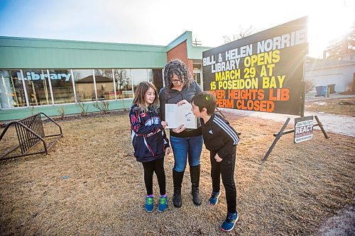 MIKAELA MACKENZIE / WINNIPEG FREE PRESS

Sara Robert and her kids, Elodie (nine) and Drew (seven), pose for a portrait at the closed River Heights Library in Winnipeg on Monday, March 22, 2021. For Jen Zoratti story.

Winnipeg Free Press 2021