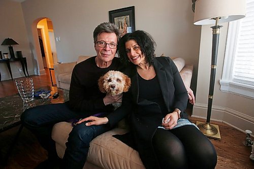 JOHN WOODS / WINNIPEG FREE PRESS
Jeff Neill, guitarist with Streetheart, and partner Renate Singh with their dog Eddie Van Howlin are photographed in Winnipeg Monday, March 22, 2021. Neill is turning 65 and celebrating 40 years with the Winnipeg rock band.

Reporter: sanderson