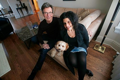 JOHN WOODS / WINNIPEG FREE PRESS
Jeff Neill, guitarist with Streetheart, and partner Renate Singh with their dog Eddie Van Howlin are photographed in Winnipeg Monday, March 22, 2021. Neill is turning 65 and celebrating 40 years with the Winnipeg rock band.

Reporter: sanderson