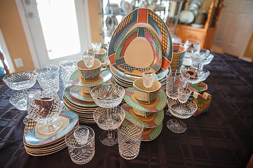 MIKE DEAL / WINNIPEG FREE PRESS
Janice Perkins, owner of Missing Pieces (646 Academy Road). 
A set of Rosenthal dinnerware in the Flash pattern.
Since '93, Janice has searched high and low for dinnerware, flatware etc. that customers from all over the world have requested, to complete a cherished set. She started with zero inventory, working out of a bedroom in a three-bedroom apartment, outgrew three spaces (including a retail operation, also on Academy) before moving to her current digs, one year ago. 
See Dave Sanderson story
210324 - Wednesday, March 24, 2021.