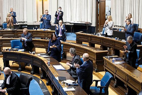 JOHN WOODS / WINNIPEG FREE PRESS
Manitoba PC cabinet give premier Brian Pallister a standing ovation during question period at the Manitoba Legislature in Winnipeg Wednesday, March 24, 2021. 

Reporter: ?