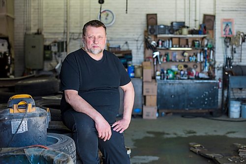 MIKAELA MACKENZIE / WINNIPEG FREE PRESS

Mike Timlick, owner of the Auto Centre on top of The Bay parking garage, poses for a portrait in the shop in Winnipeg on Thursday, March 25, 2021.  For Ben Waldman story.

Winnipeg Free Press 2021