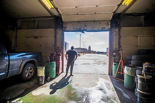 MIKAELA MACKENZIE / WINNIPEG FREE PRESS

Mike Timlick, owner of the Auto Centre on top of The Bay parking garage, poses for a portrait in the shop in Winnipeg on Thursday, March 25, 2021.  For Ben Waldman story.

Winnipeg Free Press 2021