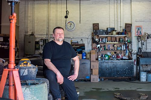 MIKAELA MACKENZIE / WINNIPEG FREE PRESS

Mike Timlick, owner of the Auto Centre on top of The Bay parking garage, poses for a portrait in the shop in Winnipeg on Thursday, March 25, 2021.  For Ben Waldman story.

Winnipeg Free Press 2021