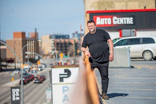 MIKAELA MACKENZIE / WINNIPEG FREE PRESS

Mike Timlick, owner of the Auto Centre on top of The Bay parking garage, poses for a portrait in front of the garage in Winnipeg on Thursday, March 25, 2021.  For Ben Waldman story.

Winnipeg Free Press 2021
