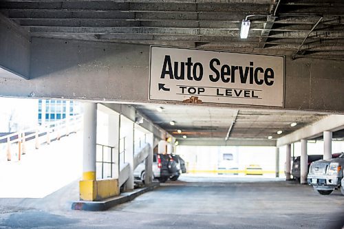 MIKAELA MACKENZIE / WINNIPEG FREE PRESS

Signs for the Auto Centre on top of The Bay parking garage in Winnipeg on Thursday, March 25, 2021.  For Ben Waldman story.

Winnipeg Free Press 2021