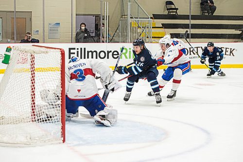 MIKE SUDOMA / WINNIPEG FREE PRESS 
Moose Left Wing, Peter Kreiger, takes the puck to the Laval Rockets net as the Manitoba Moose face off against the Laval Rocket Thursday evening at the Bell MTS Iceplex 
March 21, 2021