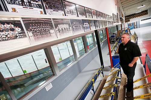 JOHN WOODS / WINNIPEG FREE PRESS
Ken Pearson, Neepawa Native head coach and GM, looks at photos of the Natives junior teams in the lobby at Yellowhead Centre arena in Neepawa Thursday, March 25, 2021. The Natives are planning a name change.

Reporter: Sawatzky