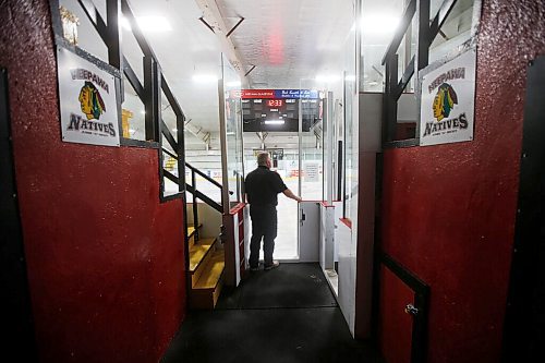 JOHN WOODS / WINNIPEG FREE PRESS
Old signage frames Ken Pearson, Neepawa Native head coach and GM, as he looks out on the rink at Yellowhead Centre arena in Neepawa Thursday, March 25, 2021. The Natives are planning a name change.

Reporter: Sawatzky