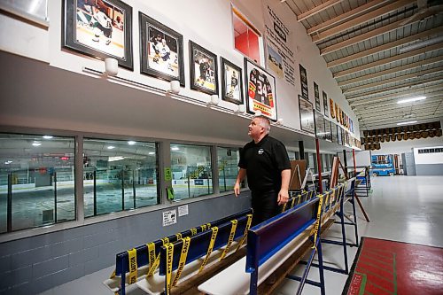 JOHN WOODS / WINNIPEG FREE PRESS
Ken Pearson, Neepawa Native head coach and GM, looks at memorabilia in the lobby at Yellowhead Centre arena in Neepawa Thursday, March 25, 2021. The Natives are planning a name change.

Reporter: Sawatzky 
