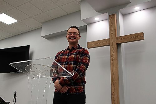 Canstar Community News Pastor Christian Loewen stands in Oak Bluff Bible Church on March 23. Loewen became the church's leader in October of 2020. (GABRIELLE PICHÉ/CANSTAR COMMUNITY NEWS/HEADLINER)