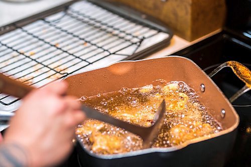 MIKAELA MACKENZIE / WINNIPEG FREE PRESS

Chef Mark Merano makes Korean fried chicken at home in Winnipeg on Monday, March 29, 2021.  For Eva Wasney story.

Winnipeg Free Press 2021