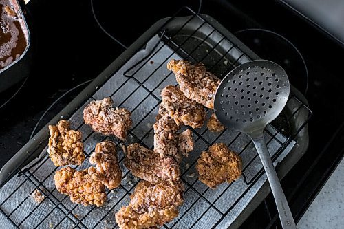 MIKAELA MACKENZIE / WINNIPEG FREE PRESS

Fried chicken, ready to be tossed with a Korean sauce, in Chef Mark Merano's kitchen at home in Winnipeg on Monday, March 29, 2021.  For Eva Wasney story.

Winnipeg Free Press 2021