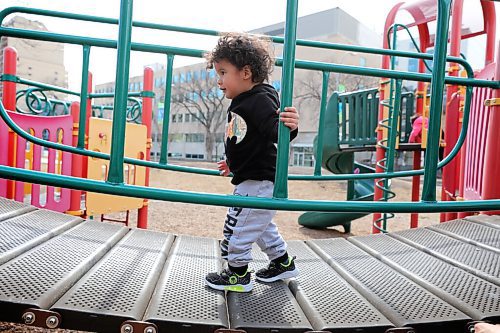 RUTH BONNEVILLE / WINNIPEG FREE PRESS 

Local - Central Park safety

Two-year-old Christian (no last name provided), runs across a bridge on a play structure while playing with his siblings and parents Monday. 

Story on the reaction of of people who use Central Park to relax or play with their kids after the  shooting in the afternoon on Saturday.  


Story by Malak Abas

March 29 ,2021
