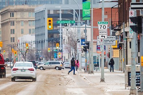 MIKAELA MACKENZIE / WINNIPEG FREE PRESS

Slushy, cold weather on Portage Avenue in Winnipeg on Tuesday, March 30, 2021.  Standup.

Winnipeg Free Press 2021