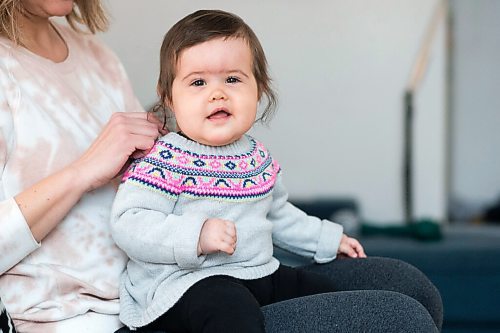 MIKAELA MACKENZIE / WINNIPEG FREE PRESS

Indira Beilfuss (nine months) poses for a portrait in her home in Winnipeg on Tuesday, March 30, 2021.  For Sarah story.

Winnipeg Free Press 2021