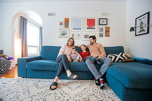 MIKAELA MACKENZIE / WINNIPEG FREE PRESS

Elizabeth Holl (left), Indira Beilfuss (nine months), Zeke Beilfuss (five), and Rodrigo Beilfuss pose for a portrait in their home in Winnipeg on Tuesday, March 30, 2021.  For Sarah story.

Winnipeg Free Press 2021