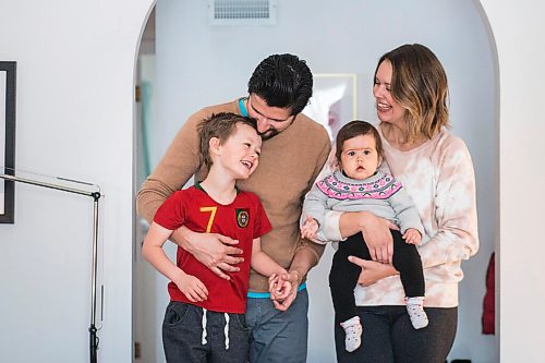 MIKAELA MACKENZIE / WINNIPEG FREE PRESS

Zeke Beilfuss (five, left), Rodrigo Beilfuss, Indira Beilfuss (nine months), and Elizabeth Holl pose for a portrait in their home in Winnipeg on Tuesday, March 30, 2021.  For Sarah story.

Winnipeg Free Press 2021