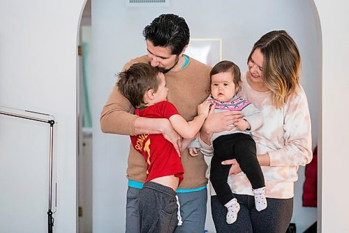 MIKAELA MACKENZIE / WINNIPEG FREE PRESS

Zeke Beilfuss (five, left), Rodrigo Beilfuss, Indira Beilfuss (nine months), and Elizabeth Holl pose for a portrait in their home in Winnipeg on Tuesday, March 30, 2021.  For Sarah story.

Winnipeg Free Press 2021